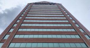 Storm clouds behind the Southeast Baltimore headquarters of CareFirst BlueCross BlueShield.