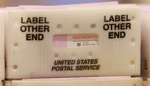 Mail-in ballots are shown in a U.S. postal box at the Los Angeles County Ballot Processing Center in the city of Industry, California, October 29, 2024. (REUTERS/Mike Blake)