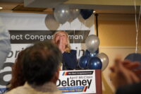 U.S. Rep. April McClain Delaney (D-6th) speaks to supporters at a watch party at the Holiday Inn in Gaithersburg, Maryland, on Tuesday, June 23, 2026. (Photo by Danielle J. Brown/Maryland Matters)