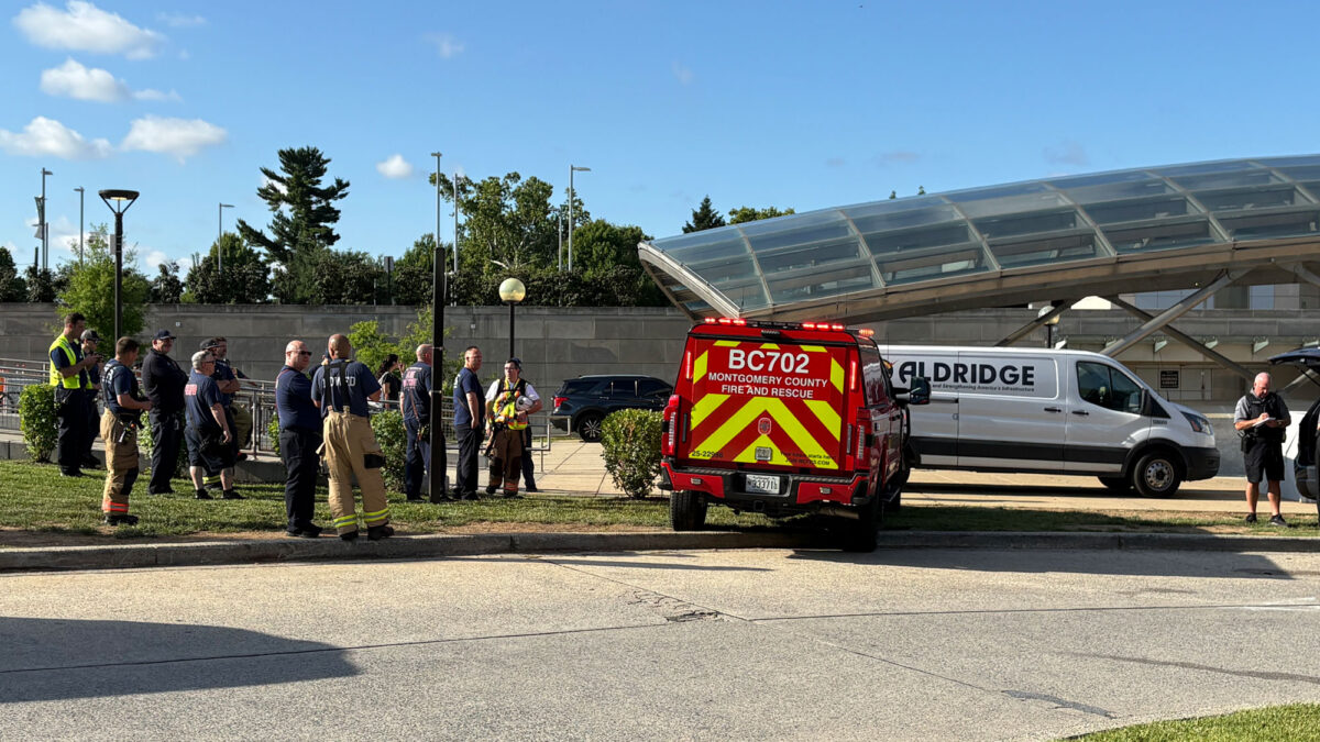 Emergency responders at the Medical Center Metro station in Bethesda on Monday. (Steve Thompson/The Washington Post)