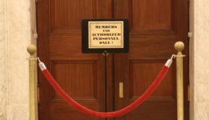 A sign at the entrance to the House of Delegates chamber. (File photo by Danielle E. Gaines/Maryland Matters)