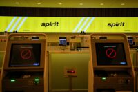 A Spirit Airlines self bag-drop counter at Orlando International Airport sits idle in Orlando, Florida, on May 2, 2026, as the airline announced it was ceasing operations following an impasse in talks with some creditors on a $500 million government bailout plan. (REUTERS/Miguel Rodriguez)