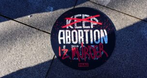 A banner is seen during a protest to ban the abortion pill, outside the U.S. Department of Health and Human Services in Washington on Jan. 22, 2026. (REUTERS/Aaron Schwartz/File Photo)