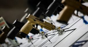 Pistols are displayed during the National Rifle Association annual meeting in Atlanta on April 25, 2025. (REUTERS/Jeenah Moon)