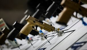 Pistols are displayed during the National Rifle Association annual meeting in Atlanta on April 25, 2025. (REUTERS/Jeenah Moon)