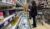 People shop for groceries at a store in Manhasset, New York, on Nov. 19, 2025. (REUTERS/Shannon Stapleton)