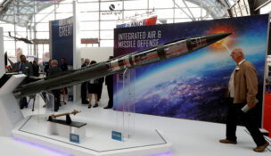 A man looks at a Patriot Advanced Capability (PAC-3) Missile Segment Enhancement (MSE) model by Lockheed Martin at an international military fair in Kielce, Poland, September 7, 2017. (REUTERS/Kacper Pempel/File Photo)
