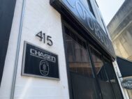 A sign at The Courtland, a 15-unit former Chasen Cos. apartment building in downtown Baltimore, bears the name of the collapsed real estate business.