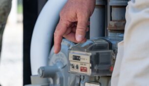 An inspector points to a gas meter during a Chesapeake Utilities training session in 2023. A court case filed in Baltimore says Maryland’s utility regulators are not enforcing a 2025 state law that was supposed to save consumers money by setting new restrictions on gas pipeline replacement. (Photo by Senior Airman Cydney Lee/U.S. Air Force)
