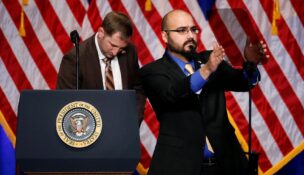 Gabriel Perez adjusts the teleprompter before President Donald Trump delivers remarks regarding the Administration's National Security Strategy at the Ronald Reagan Building and International Trade Center in Washington on Dec. 18, 2017. (REUTERS/Joshua Roberts/File Photo)