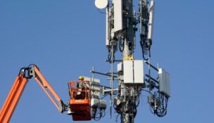 A contract crew from Verizon installs 5G telecommunications equipment on a tower in Orem, Utah, on Dec. 3, 2019. (REUTERS/George Frey/File Photo)