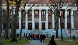 Students walk past Widener Library at Harvard University in Cambridge, Massachusetts, Nov. 19, 2025. (REUTERS/Reba Saldanha/File Photo)