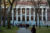 Students walk past Widener Library at Harvard University in Cambridge, Massachusetts, Nov. 19, 2025. (REUTERS/Reba Saldanha/File Photo)