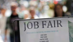 Signage for a job fair is seen on 5th Avenue in Manhattan, New York City, September 3, 2021. (REUTERS/Andrew Kelly/File Photo)