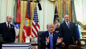 U.S. President Donald Trump, with White House Deputy Chief of Staff Stephen Miller and U.S. Secretary of Commerce Howard Lutnick, speaks during an event to sign executive orders related to birthright citizenship and the polysilicon industry, in the Oval Office at the White House in Washington, D.C., August 6, 2026. (REUTERS/Evelyn Hockstein)