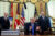 U.S. President Donald Trump, with White House Deputy Chief of Staff Stephen Miller and U.S. Secretary of Commerce Howard Lutnick, speaks during an event to sign executive orders related to birthright citizenship and the polysilicon industry, in the Oval Office at the White House in Washington, D.C., August 6, 2026. (REUTERS/Evelyn Hockstein)