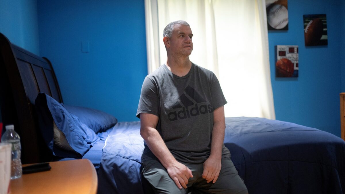 Richie Rosen, a resident of a facility that houses people with developmental disabilities, where three Haitian caregivers who held Temporary Protected Status (TPS) worked until the Supreme Court decision ended TPS for Haitians, poses for a portrait in New City, New York, on Aug. 11, 2026. (REUTERS/Vincent Alban)