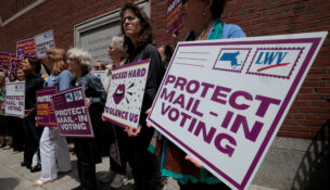 Supporters gather outside the federal courthouse after a hearing in a lawsuit brought by a coalition of Democratic state attorneys general seeking to block President Donald Trump's executive order tightening rules on mail-in voting, in Boston on June 2, 2026. (REUTERS/Brian Snyder)