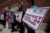 Supporters gather outside the federal courthouse after a hearing in a lawsuit brought by a coalition of Democratic state attorneys general seeking to block President Donald Trump's executive order tightening rules on mail-in voting, in Boston on June 2, 2026. (REUTERS/Brian Snyder)