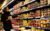 A woman shops for fruit in a store in New York City on Feb. 12, 2025. (REUTERS/Brendan McDermid)